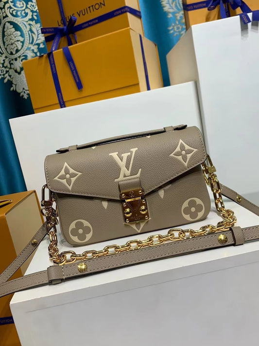 Louis Vuitton Pochette Métis Monogram Empreinte in Taupe Beige