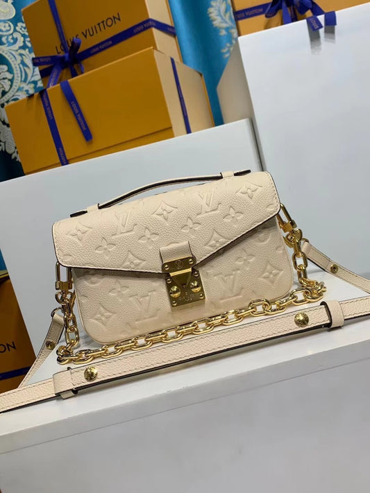 Louis Vuitton Pochette Métis Monogram Empreinte Crème