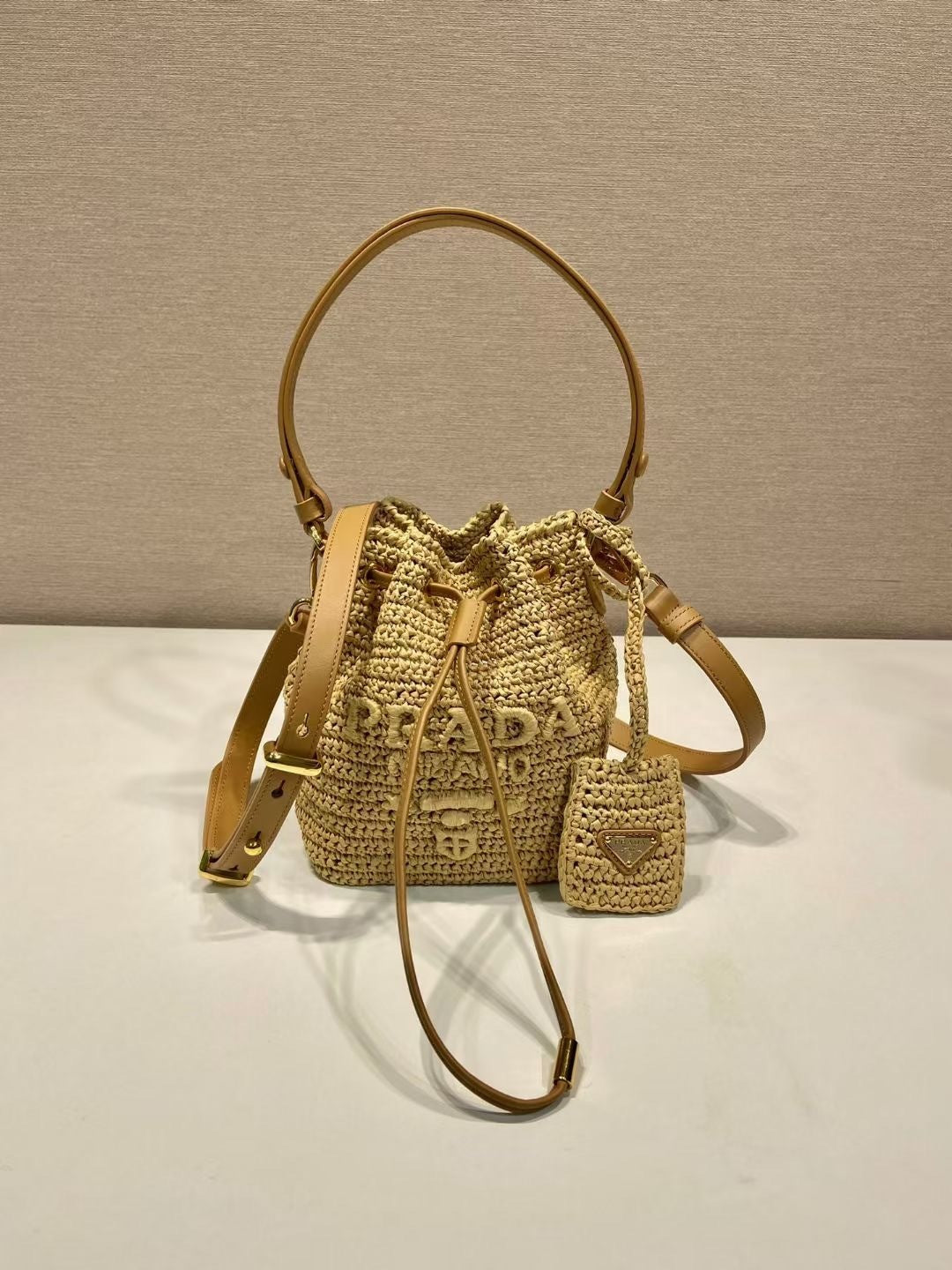 Prada Raffia Bucket Bag – Natural Beige